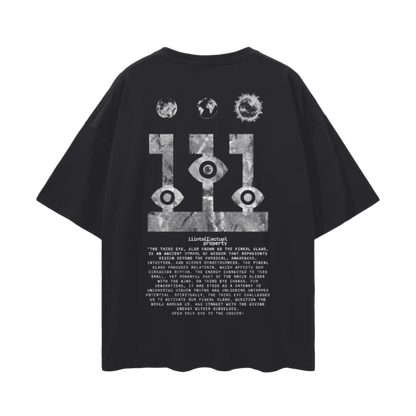 Black short-sleeved drop shoulder t-shirt with graphic print in the center featuring abstract designs about pineal gland